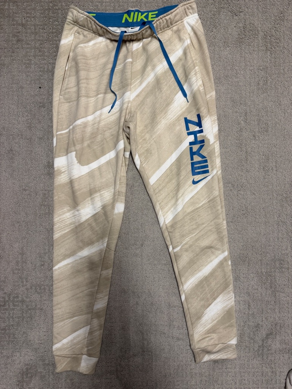 Nike Tan & White Brushed Stripe Joggers with Blue Logo